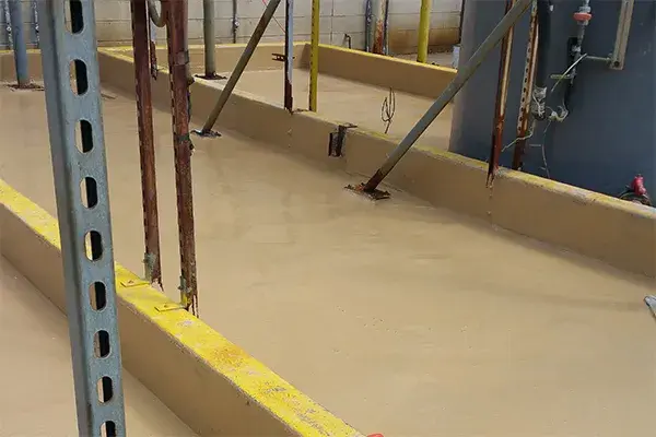 secondary containment area concrete protective coating first layer applied