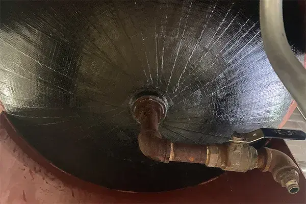 air separator domed tank bottom corrosion repair with composite wrap