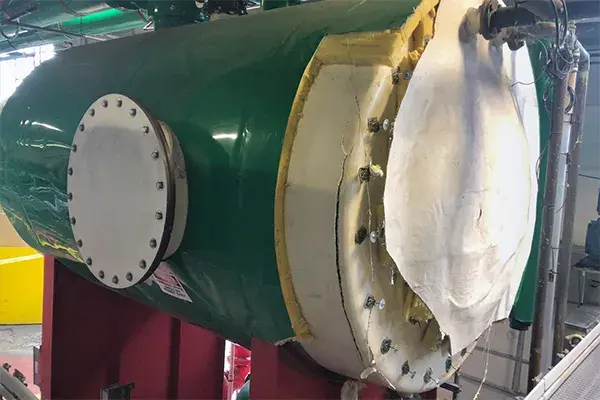 cracked fiberglass storage tank