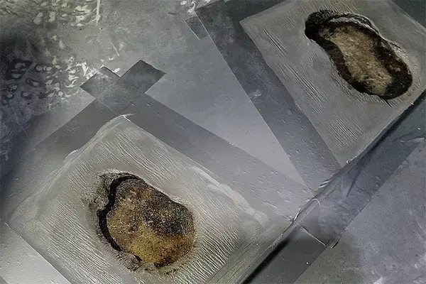 holes in scrubber tank bottom