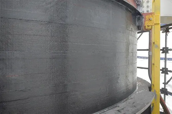 storage tank corrosion repair with belzona carbon fiber composite wrap